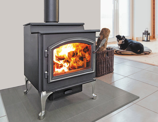 Quadra-Fire 5700 Step Top fireplace stove with a black metal finish and glass door, showing the stove's design and control panel.