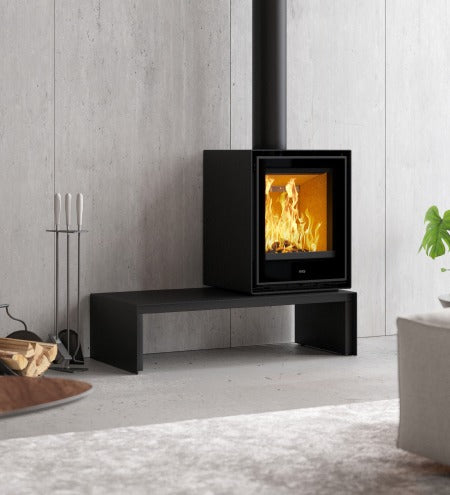 ADF Clare 60S VT B fireplace with a modern design and glass front, featuring a sleek metal finish and realistic fire display.