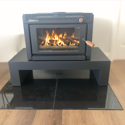 Black Burning Log Turbo 10 wood fireplace with metallic finish, showcasing the sleek design of the Burning Log brand fireplace.