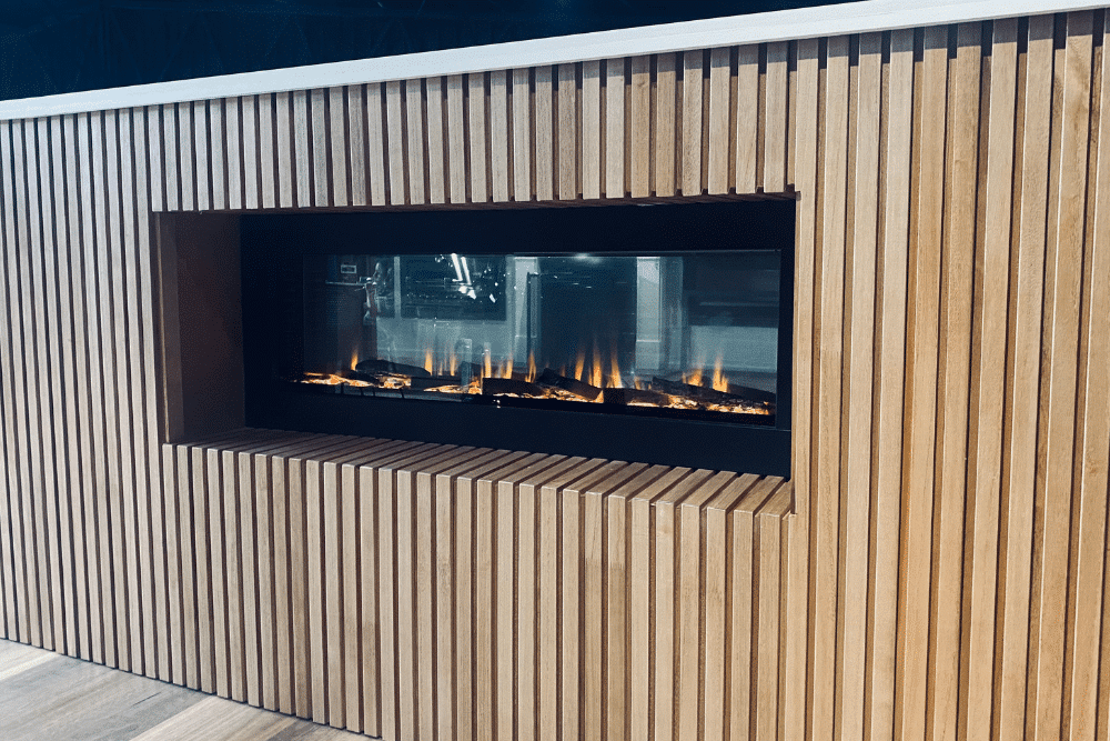 ilektro 1250 Tunnel double-sided electric fireplace built into a timber feature wall