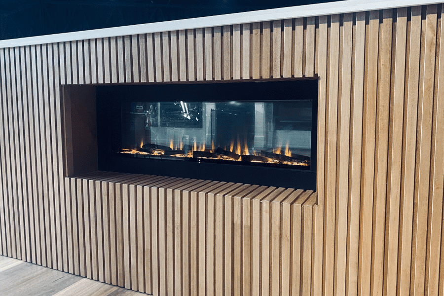 ilektro 1250 Tunnel double-sided electric fireplace built into a timber feature wall