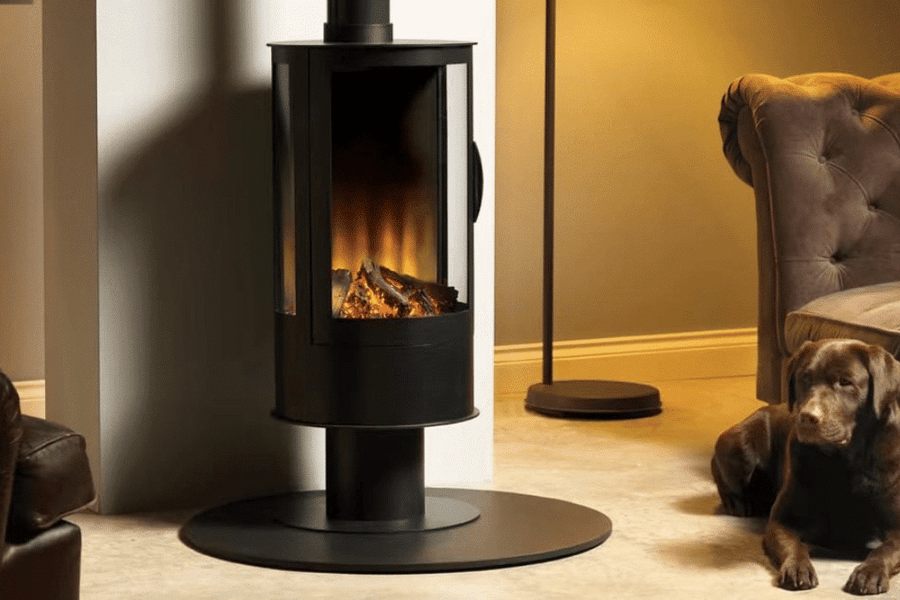 ilektro i650 Freestanding electric fireplace with three-sided curved glass in a modern living room