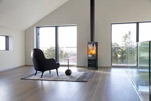 Jøtul F 370 V2 Advance freestanding wood heater in a modern living room