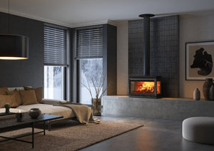Jøtul F 620 wood heater with low base installed in a modern living room