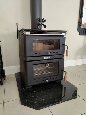 Kalora Fusion stove style fireplace with wood storage and fire burning