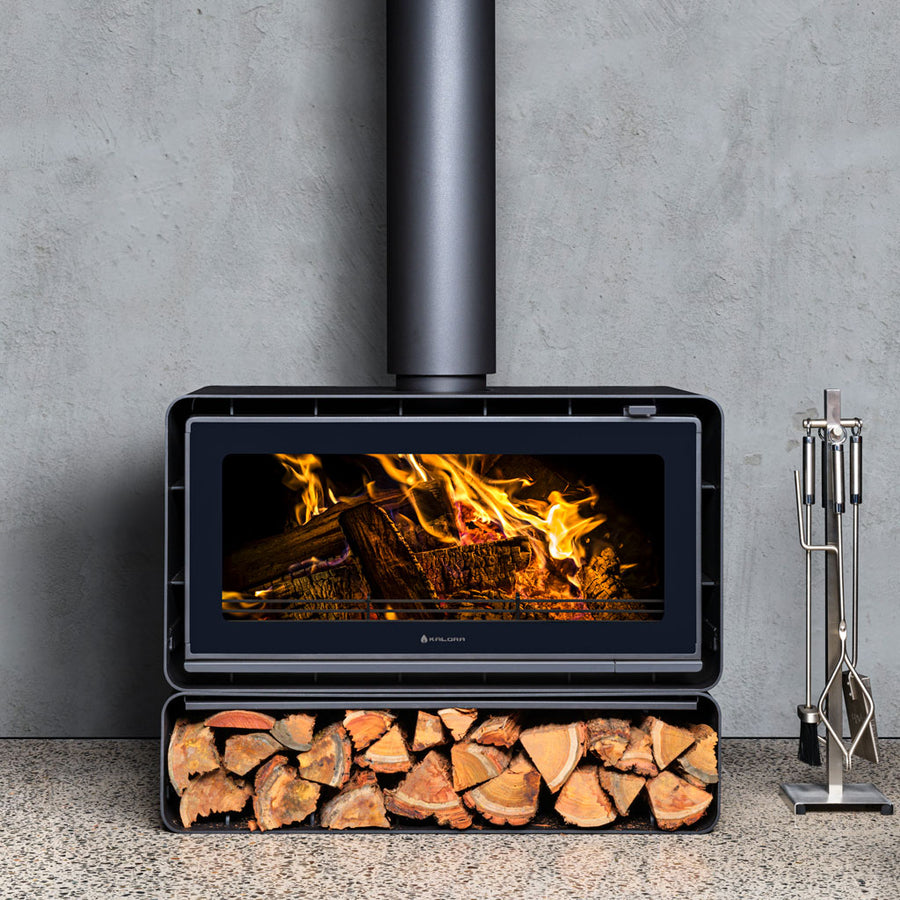 Kalora Urban LS landscape wood heater with integrated firewood storage woodbox