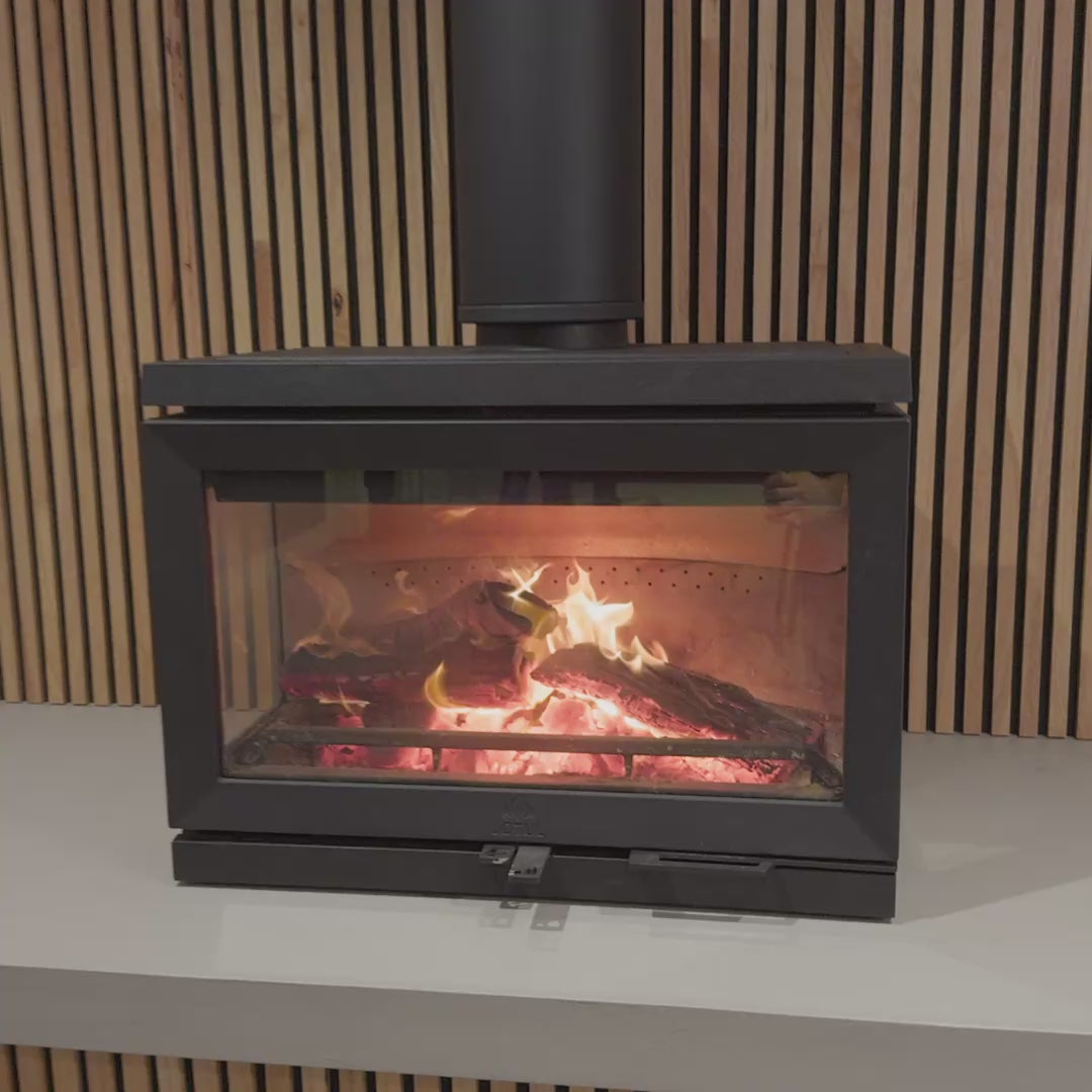 Jøtul F 620 wood heater burning with a wide panoramic view of the fire