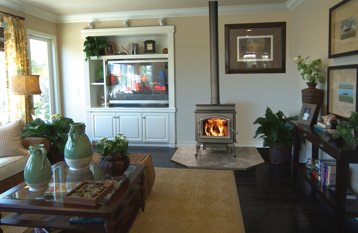 Quadra-Fire 4300 Step Top wood heater installed in a traditional living room
