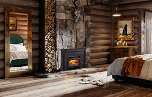 Quadra-Fire Expedition 1 wood insert installed in a stone fireplace