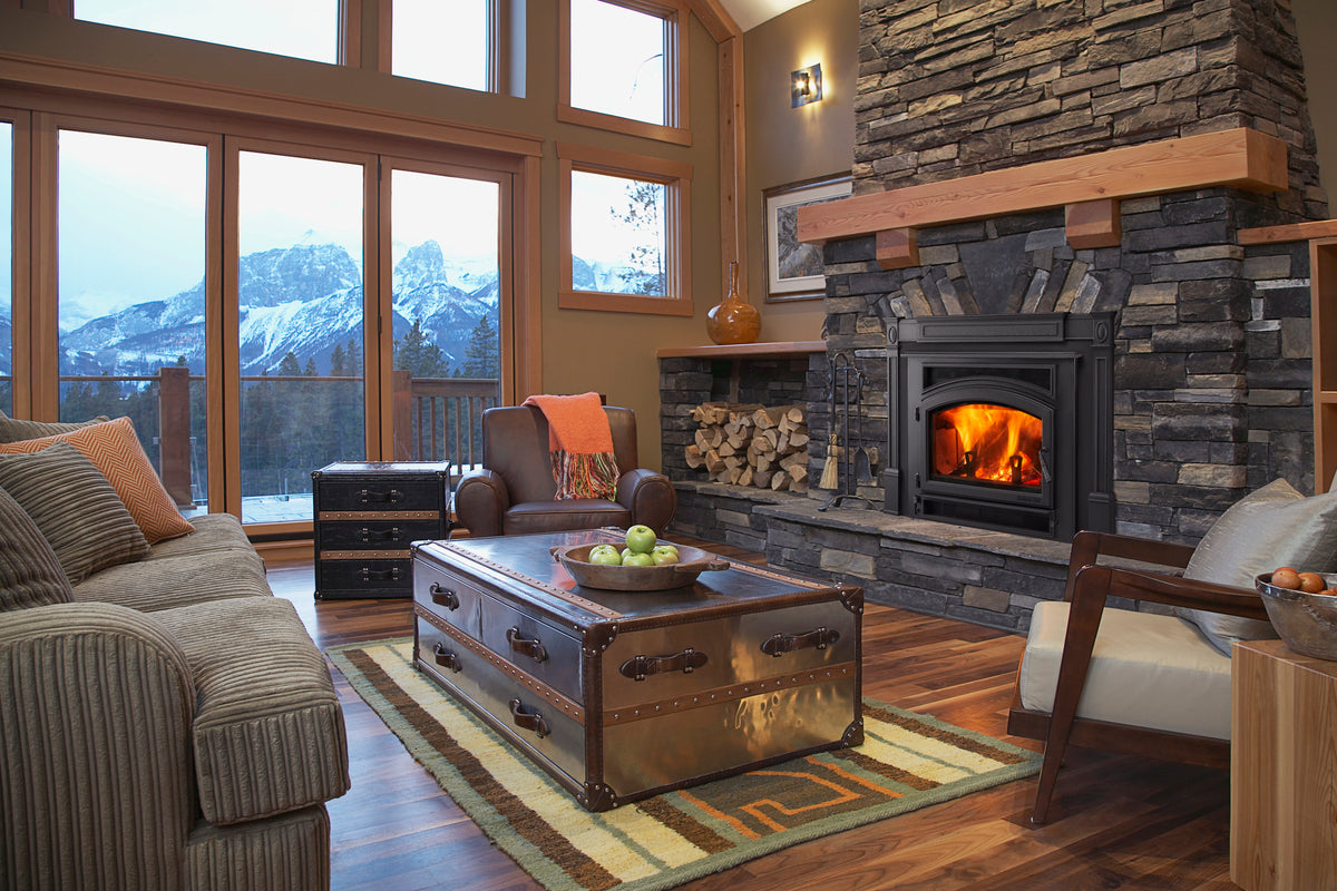 Quadra-Fire Expedition 2 wood insert installed in a stone fireplace