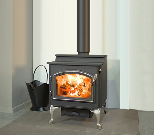 Quadra-Fire 5700 Step Top fireplace stove with a sleek metal finish and step top design, viewed from an angled perspective.