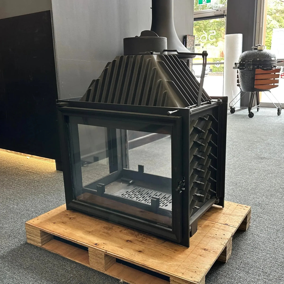 Siena 750 Peninsula multi-sided wood fireplace showing panoramic glass viewing