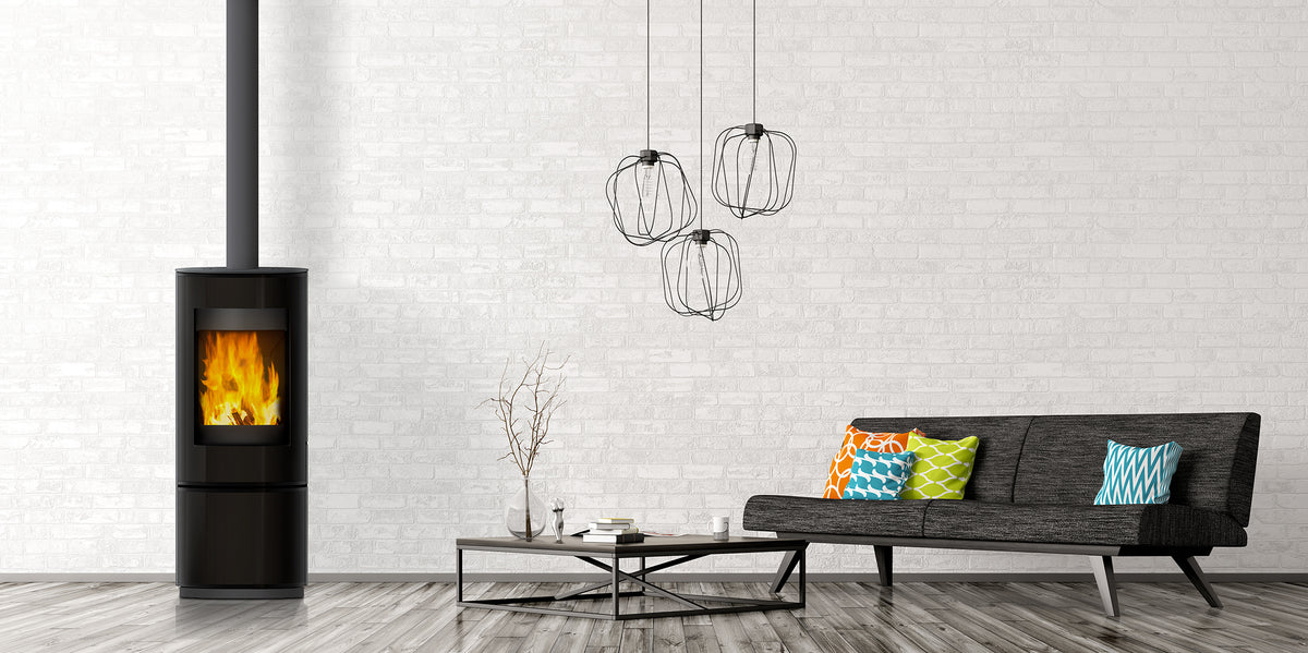 VisionLINE Circle freestanding wood heater installed in a modern living room