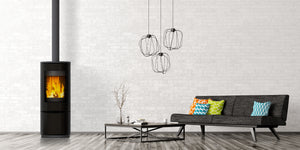 VisionLINE Circle freestanding wood heater installed in a modern living room
