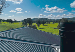 VisionLINE pellet heater flue installed through a metal roof in Regional NSW