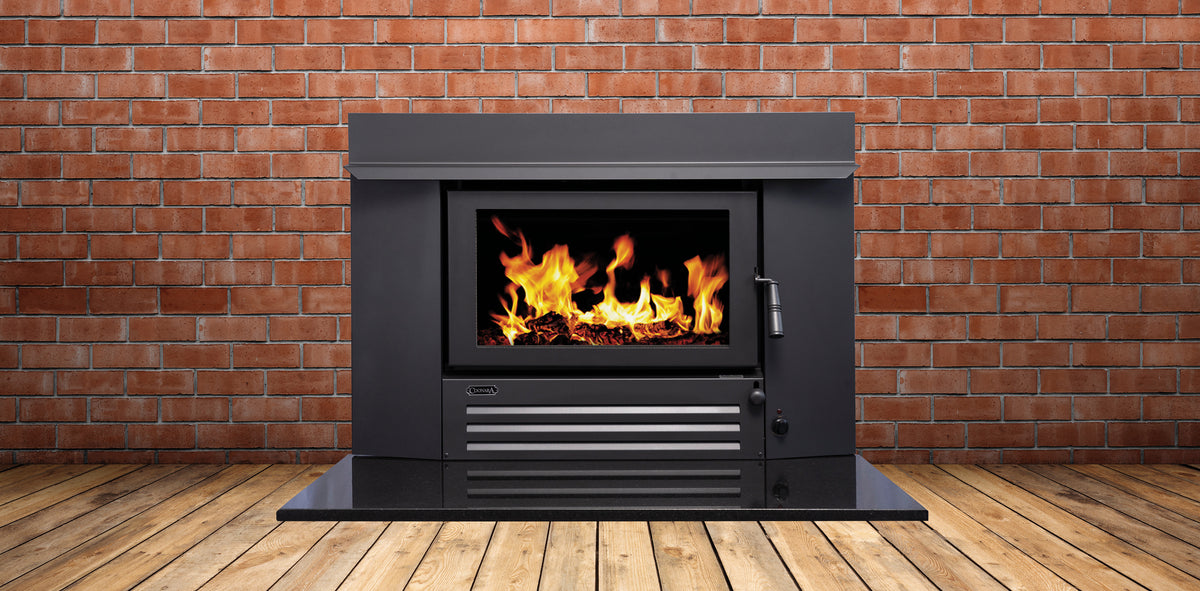Coonara Settler I600 inbuilt wood heater installed in a brick fireplace